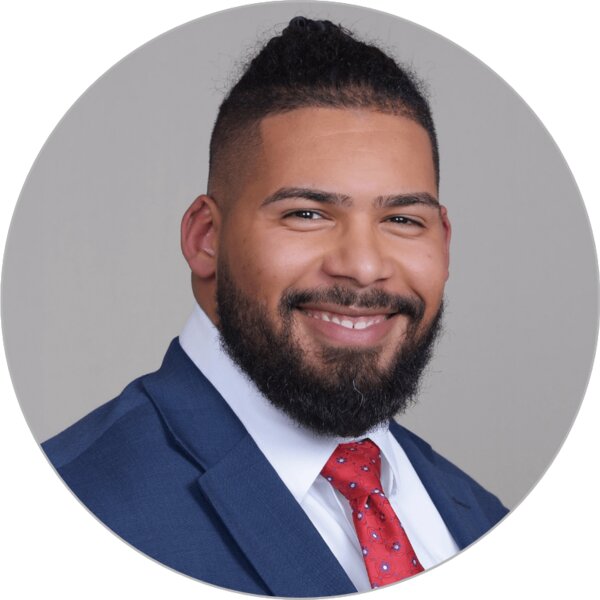 Portrait of Brian Bello, Research and Assessment Associate.