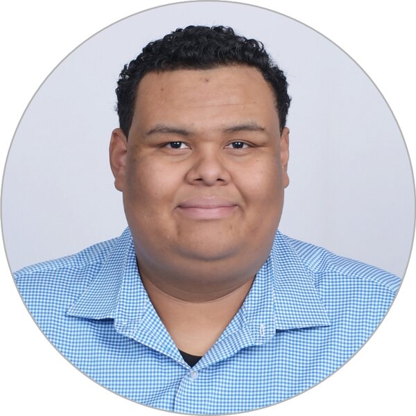 Portrait of Kazi Baker, IT Department Head and Consultant.